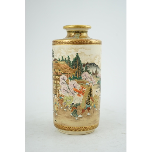 41 - A Japanese Satsuma Spring festival cylindrical vase, Meiji period, painted with a man carrying a l... 