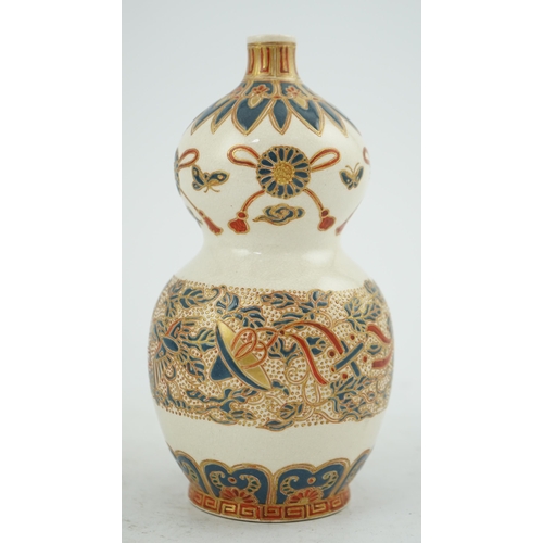 43 - A Japanese Satsuma double gourd-shaped vase, 19th century, the upper section painted with ribbon tie... 