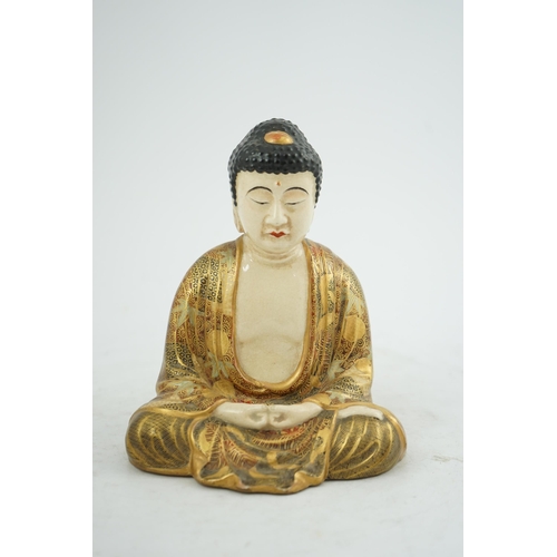 45 - A Japanese Satsuma seated figure of Buddha, Meiji period, two character signature to base, 18.4cm hi... 