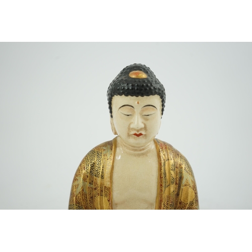 45 - A Japanese Satsuma seated figure of Buddha, Meiji period, two character signature to base, 18.4cm hi... 