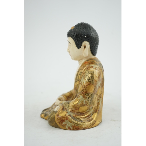 45 - A Japanese Satsuma seated figure of Buddha, Meiji period, two character signature to base, 18.4cm hi... 