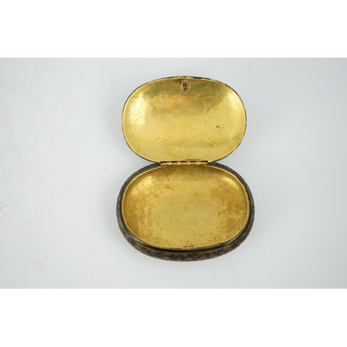 58 - A Japanese export gilt bronze Sawasa oval tobacco box, 18th century, the flush cover bas-relief deco... 