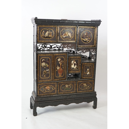 64 - A Japanese Shibayama style inlaid wood cabinet, Meiji period, inlaid in ivory, coloured stone and ot... 