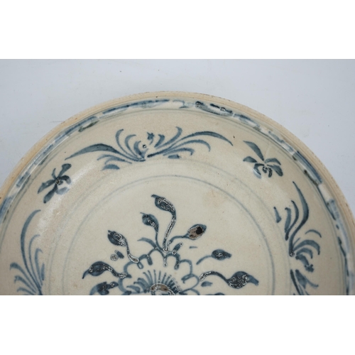 65 - A Vietnamese blue and white porcelain dish, Hoi An Hoard, 15th century, painted floral design inside... 