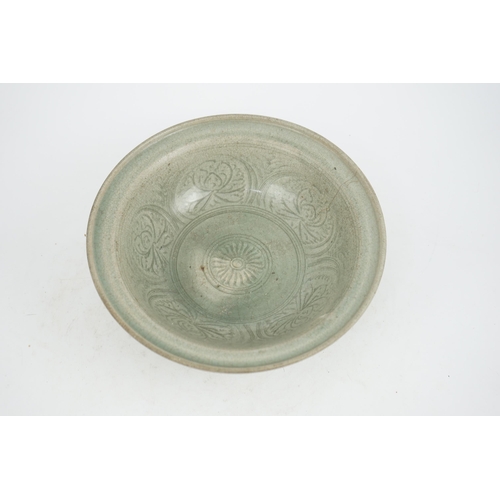 66 - A large Thai celadon glazed bowl, Sawankhalok kilns, 14th / 15th century, heavily-potted with flared... 