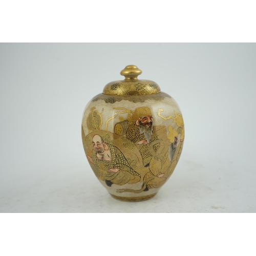 7 - A Japanese Satsuma Shichi-fuku-Jin octagonal jar and cover, Meiji period, painted with the Seven G... 