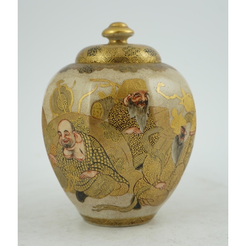 7 - A Japanese Satsuma Shichi-fuku-Jin octagonal jar and cover, Meiji period, painted with the Seven G... 