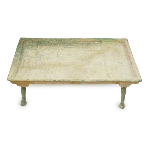 71 - A rare Chinese glazed decorated pottery table with legs, Han Dynasty (206 BC-AD 220). the pottery mo... 