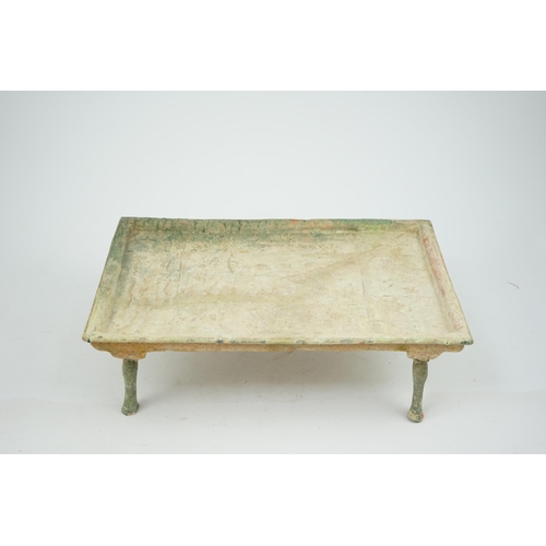 71 - A rare Chinese glazed decorated pottery table with legs, Han Dynasty (206 BC-AD 220). the pottery mo... 