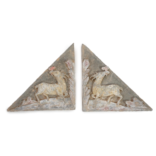 78 - A fine pair of large Chinese painted pottery triangular tiles, Ming Dynasty (1368-1644), made from g... 