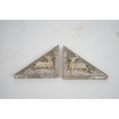 78 - A fine pair of large Chinese painted pottery triangular tiles, Ming Dynasty (1368-1644), made from g... 