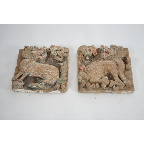 82 - A fine pair of large Chinese painted pottery Qilin, Sun and Moon tiles, Ming Dynasty (1368-1644) e... 