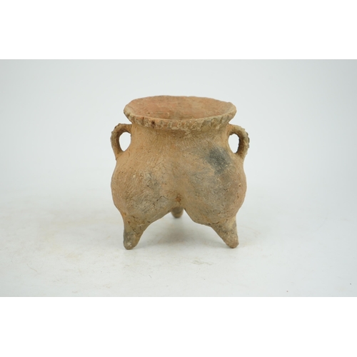 87 - A rare Chinese Neolithic pottery tripod, li, Qijia Culture (2200 BC-1600 BC), with castellated patte... 