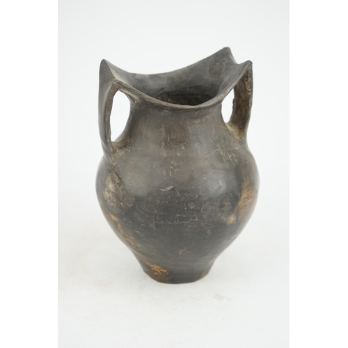 90 - A rare Chinese Neolithic Siwa Culture burnished black pottery jar (c.1350 BC), applied with high han... 