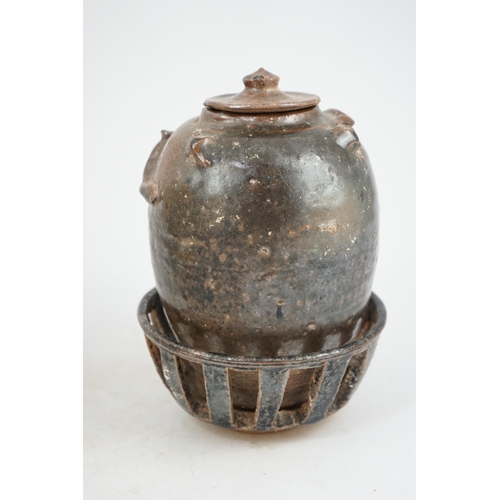 93 - A Chinese Song Dynasty stoneware jar with rare stand and cover, Song Dynasty (AD 960-1279), the oute... 