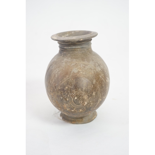 95 - A Chinese incised and burnished pottery cocoon jar, Western Han Dynasty (206 BC-AD 8), the burnished... 