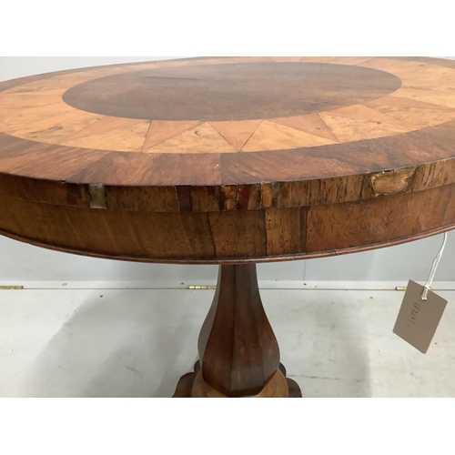 1001 - An early 19th century Continental rosewood, walnut and satinwood centre table, with parquetry top, d... 