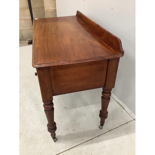 1035 - A Victorian mahogany four drawer side table, width 121cm, height 82cm. Condition - fair