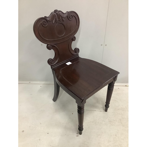 1036 - An early Victorian mahogany hall chair and a Continental inlaid oak spinning chair. Condition - both... 