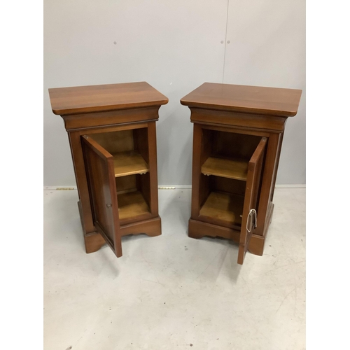 1045 - A pair of modern Continental cherry wood bedside cupboards, width 47cm, height 75cm. Condition - fai... 