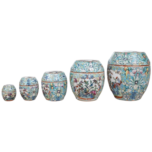 1417 - A Chinese porcelain nest of five enamelled porcelain barrel shaped boxes, c.1900, largest 12cm high.... 