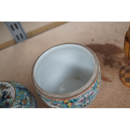 1417 - A Chinese porcelain nest of five enamelled porcelain barrel shaped boxes, c.1900, largest 12cm high.... 