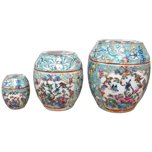 1417 - A Chinese porcelain nest of five enamelled porcelain barrel shaped boxes, c.1900, largest 12cm high.... 