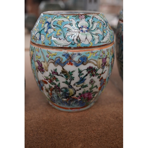 1417 - A Chinese porcelain nest of five enamelled porcelain barrel shaped boxes, c.1900, largest 12cm high.... 