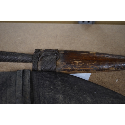 1426 - Three daggers, two with sheaths and a kukri knife, largest 33cm in length. Condition - poor