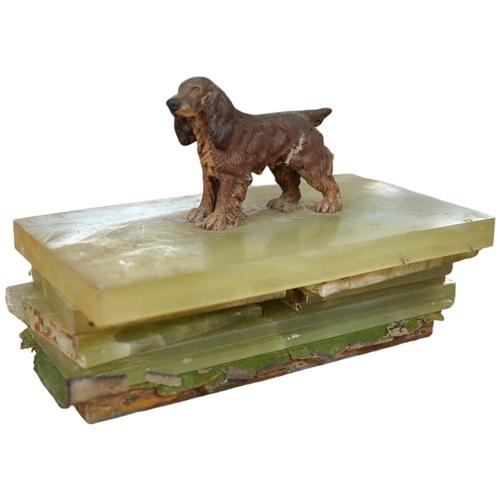 1427 - An Art Deco green onyx box, the lid surmounted with a cold painted bronze spaniel, 16.5cm wide. Cond... 