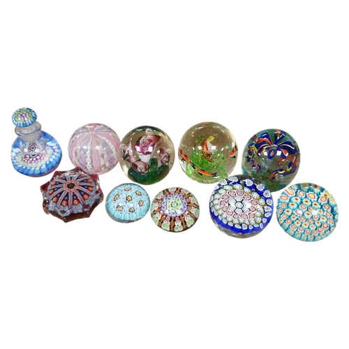 1431 - A group of ten paperweights including a scent bottle paperweight, 9.5cm. Condition - fair to good... 