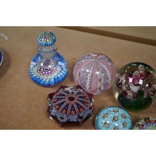 1431 - A group of ten paperweights including a scent bottle paperweight, 9.5cm. Condition - fair to good... 