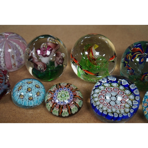 1431 - A group of ten paperweights including a scent bottle paperweight, 9.5cm. Condition - fair to good... 