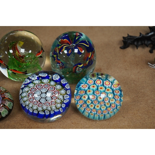 1431 - A group of ten paperweights including a scent bottle paperweight, 9.5cm. Condition - fair to good... 
