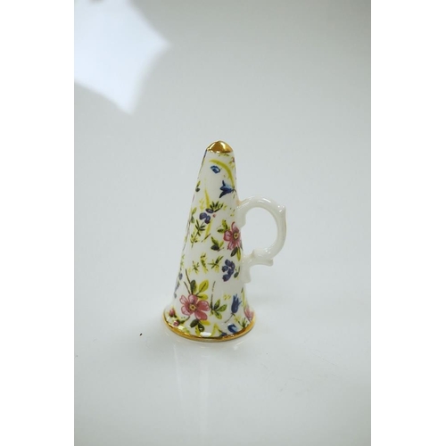 1440 - A mixed collection of miniature items including a hound whistle, a candle snuffer and a glass tea se... 