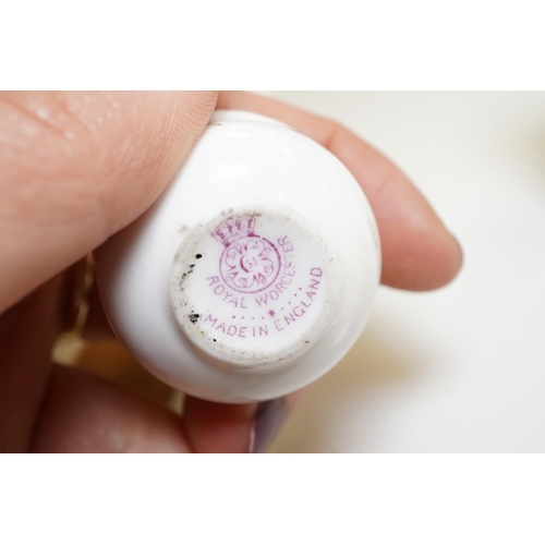 1440 - A mixed collection of miniature items including a hound whistle, a candle snuffer and a glass tea se... 