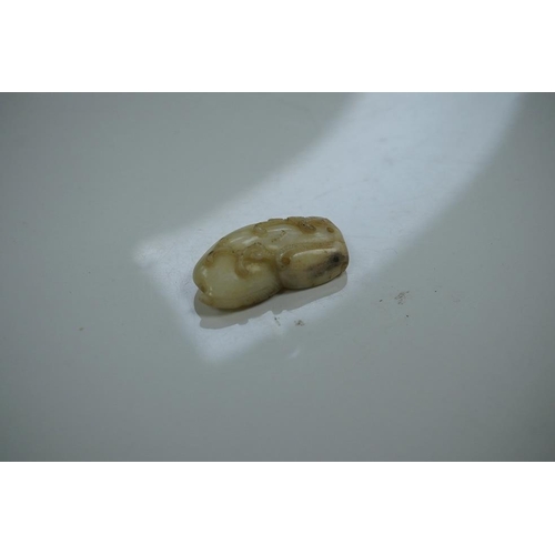 1441 - Two Chinese jade carvings, 18th/19th century including a pale jade example in the form of an animal ... 
