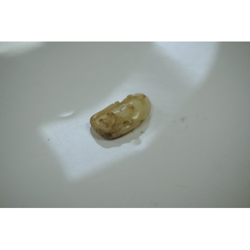 1441 - Two Chinese jade carvings, 18th/19th century including a pale jade example in the form of an animal ... 