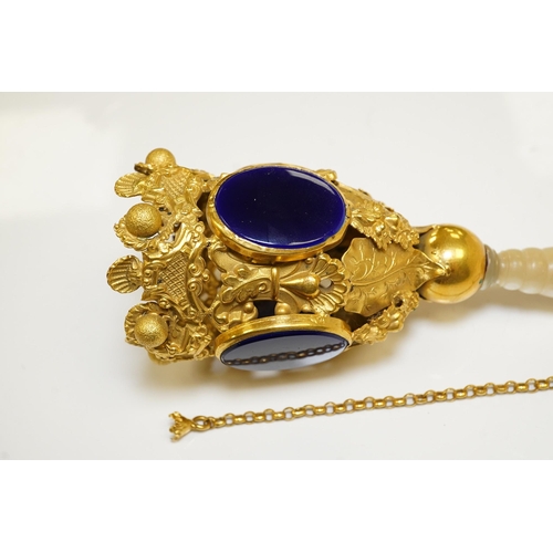 1442 - A 19th century Pinchbeck posy holder with mother of pearl handle and inset blue glass panels. Condit... 