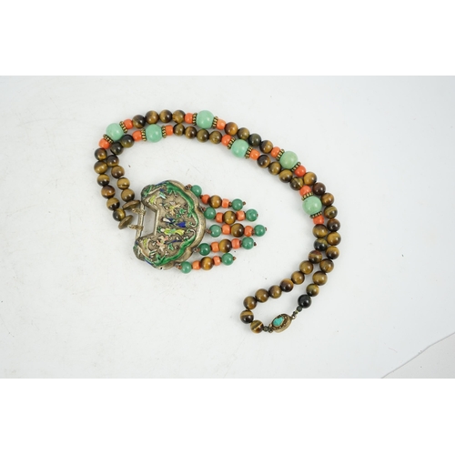 1450 - A Chinese silver and enamel amulet tiger's eye, coral and turquoise bead necklace, housed in a liber... 