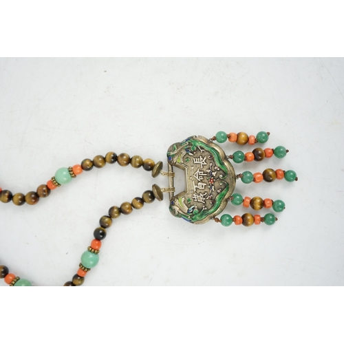 1450 - A Chinese silver and enamel amulet tiger's eye, coral and turquoise bead necklace, housed in a liber... 
