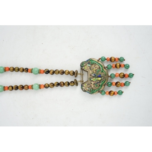 1450 - A Chinese silver and enamel amulet tiger's eye, coral and turquoise bead necklace, housed in a liber... 