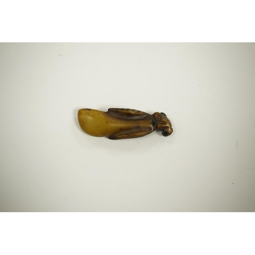 1454 - A Chinese jadeite pendant and a carving of a bud, largest 6cm high (2). Condition - good