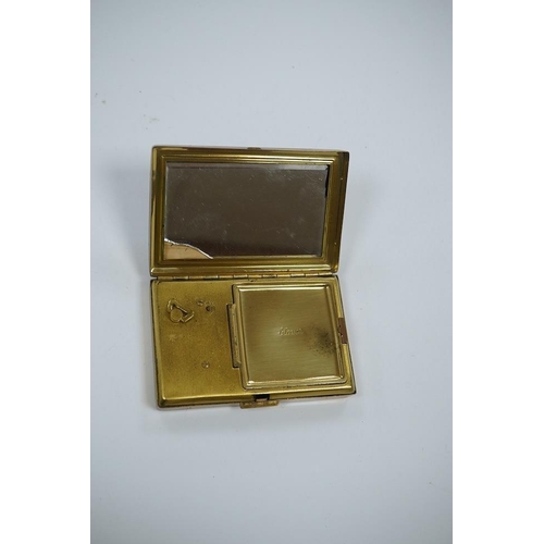 1455 - A Japanese damascened iron and gilt metal musical compact, 9cm wide. Condition - poor