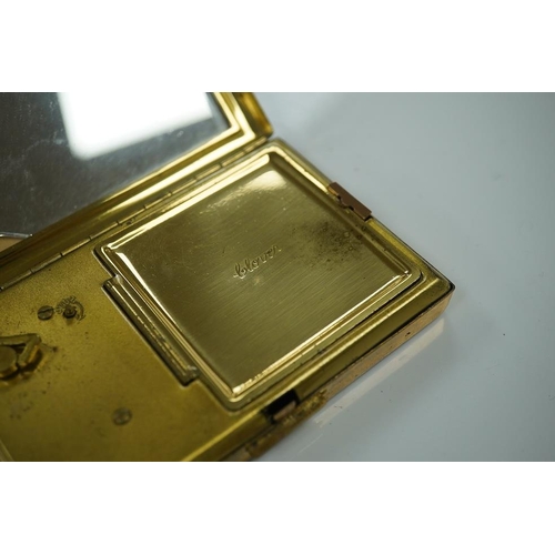 1455 - A Japanese damascened iron and gilt metal musical compact, 9cm wide. Condition - poor