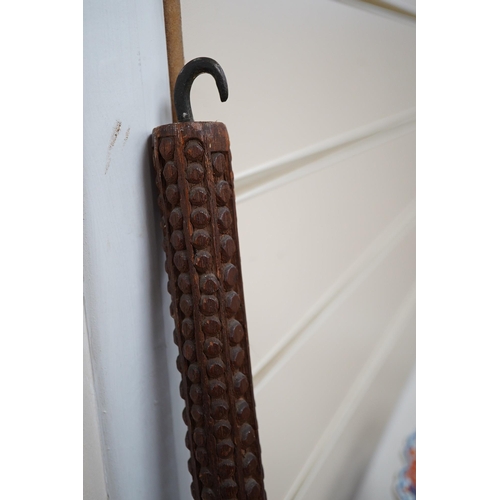 1456 - An Indonesian chip-carved Hanuman staff, 130cm. Condition - fair to good