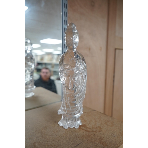 1458 - A large Chinese rock crystal figure of a standing lady holding a peony branch, 20th century, 27cm hi... 