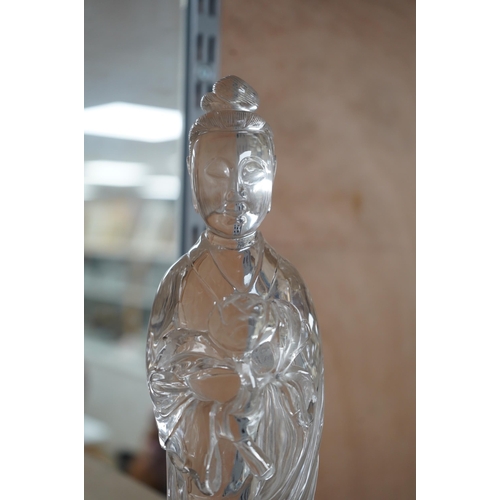 1458 - A large Chinese rock crystal figure of a standing lady holding a peony branch, 20th century, 27cm hi... 