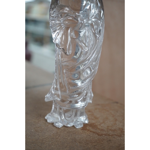 1458 - A large Chinese rock crystal figure of a standing lady holding a peony branch, 20th century, 27cm hi... 