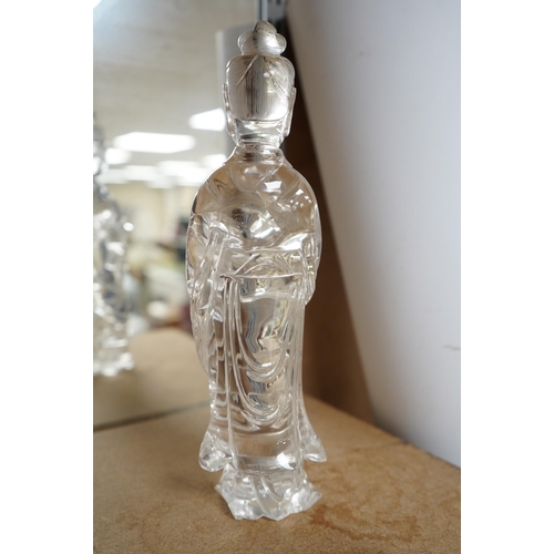 1458 - A large Chinese rock crystal figure of a standing lady holding a peony branch, 20th century, 27cm hi... 